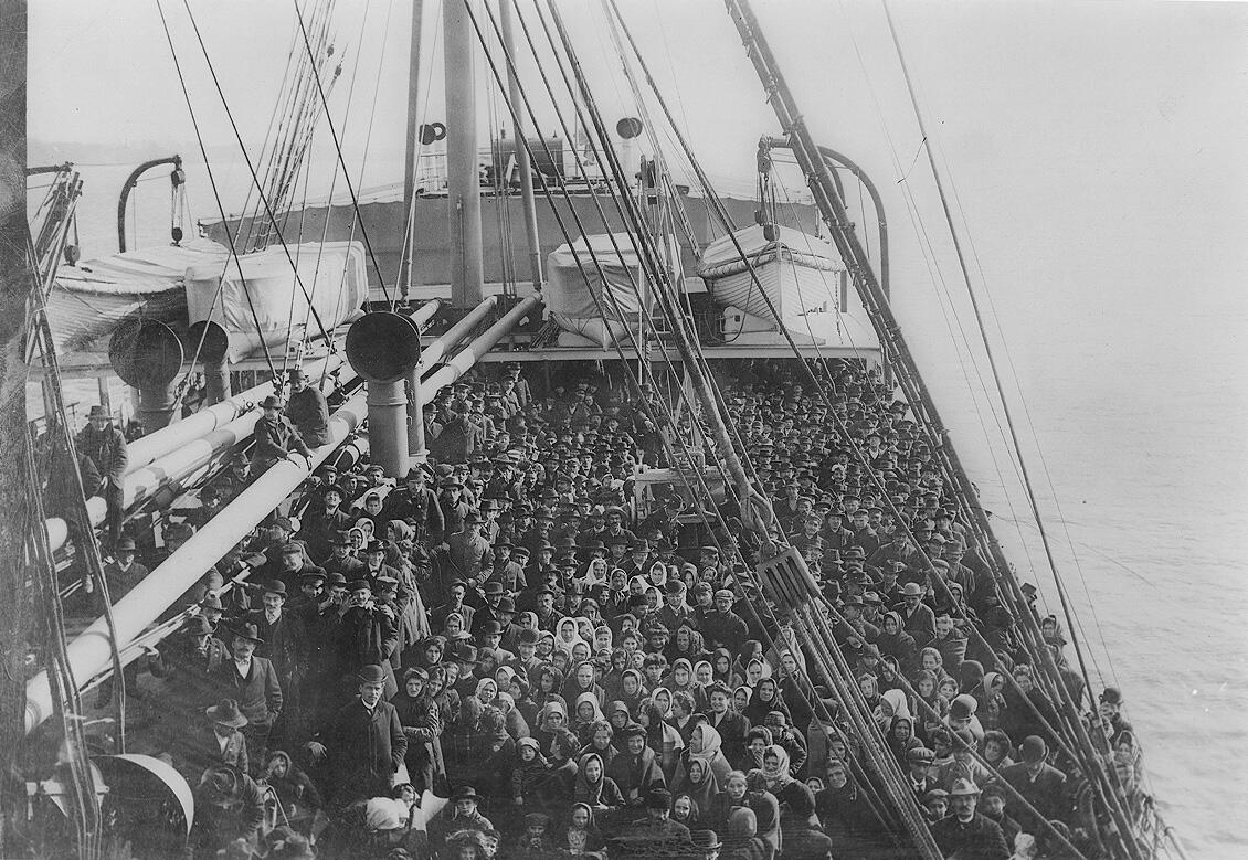 A ship deck filled with people.