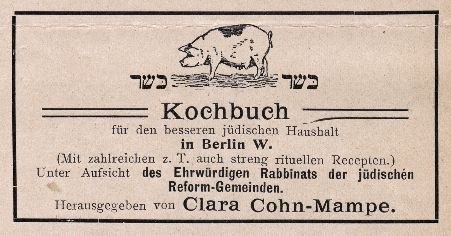 Printed page with Yiddish text and small drawing of pig.