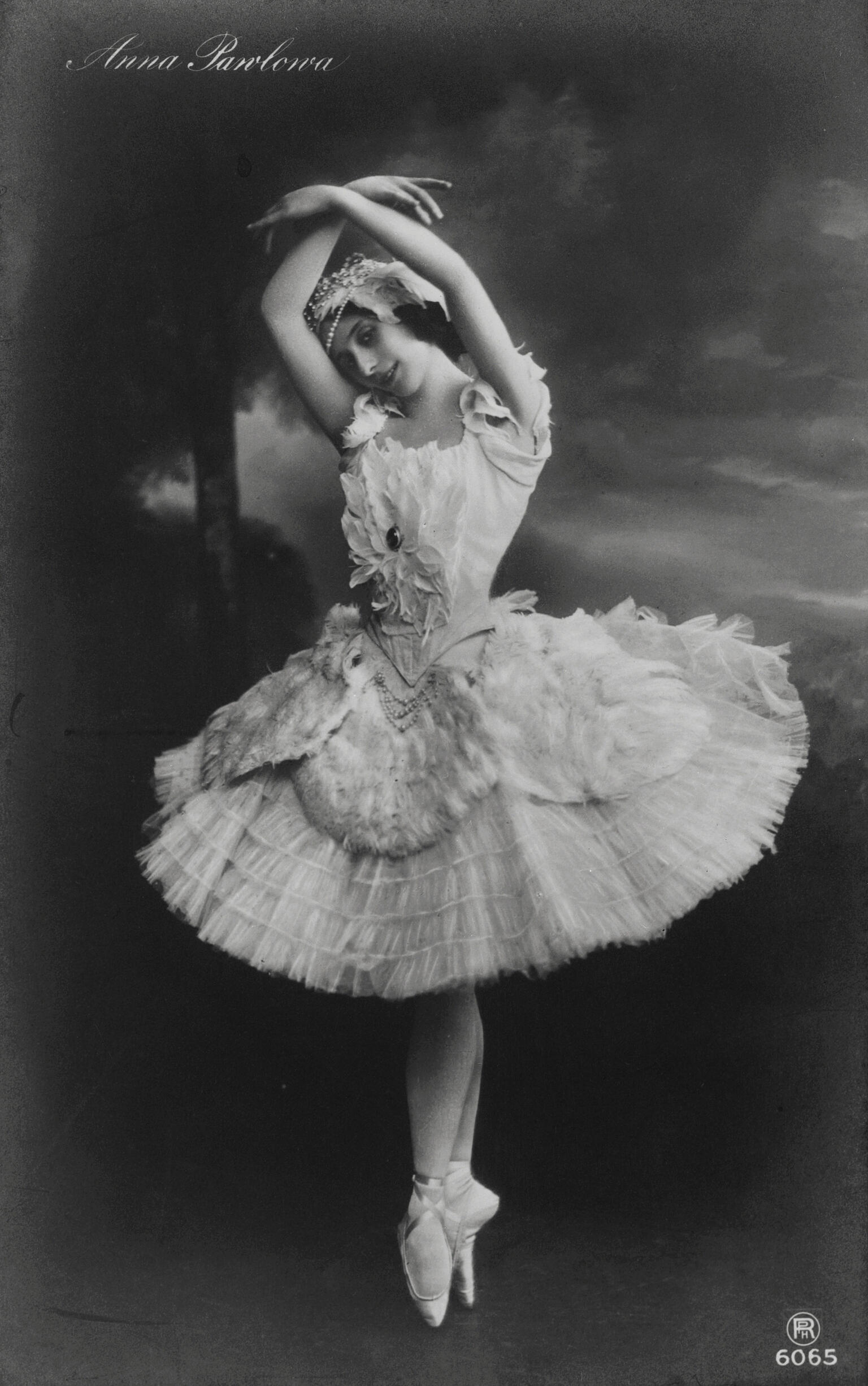 Photograph of ballerina on pointe wearing tutu. Photograph of ballerina on pointe wearing tutu.