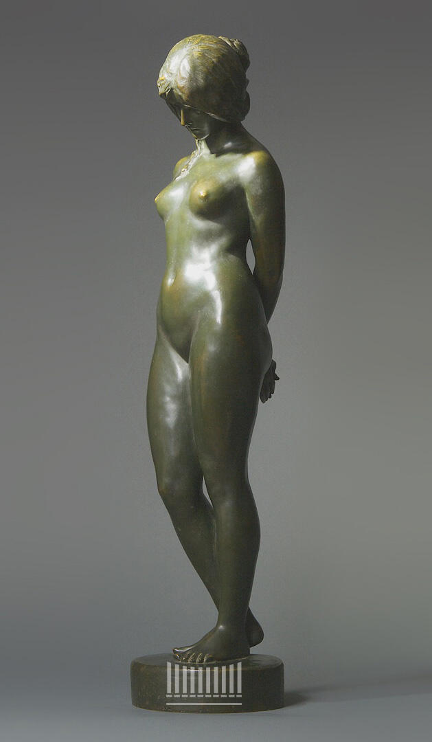 Sculpture of nude woman looking down.