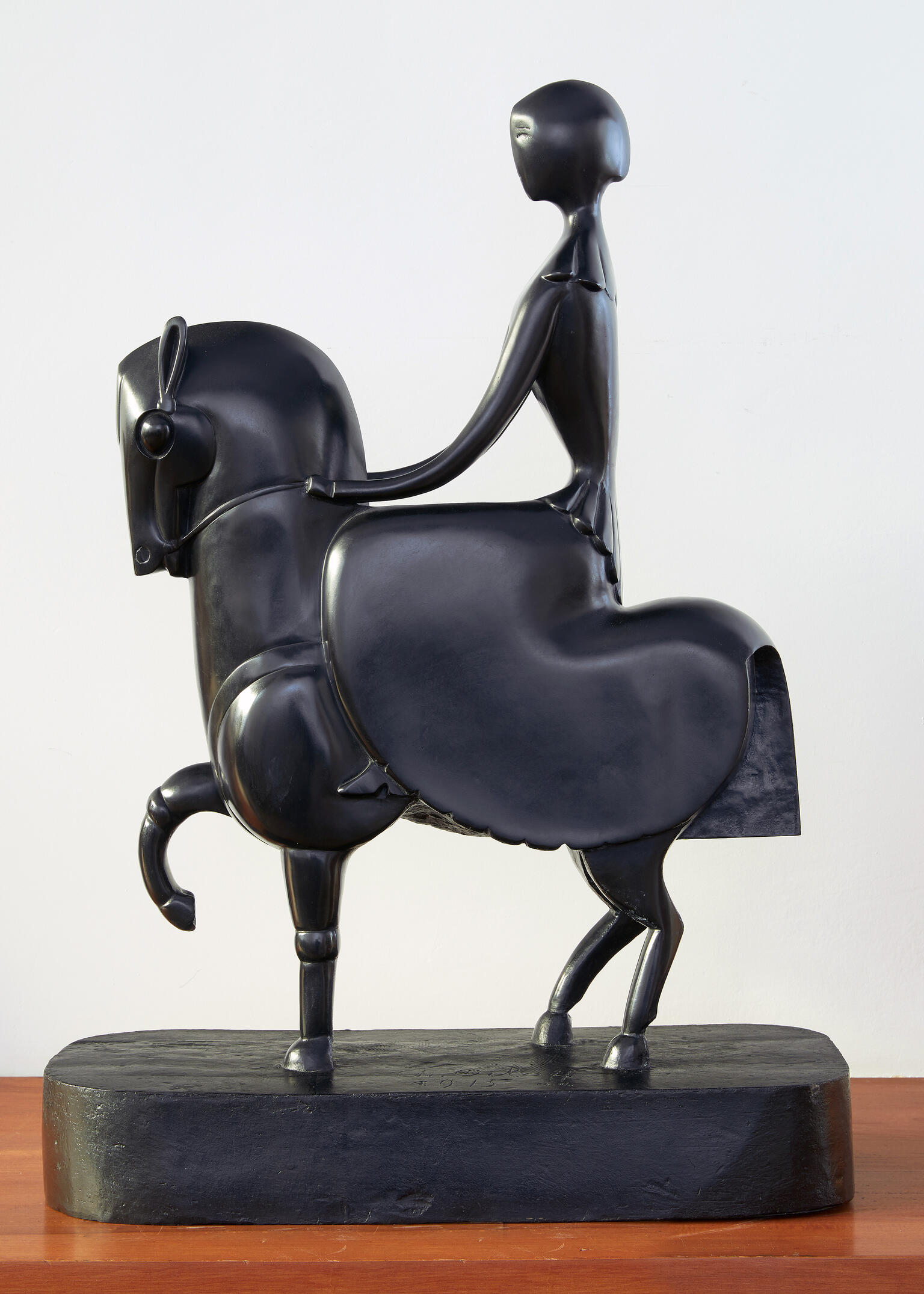 Sculpture of stylized figure on horseback.