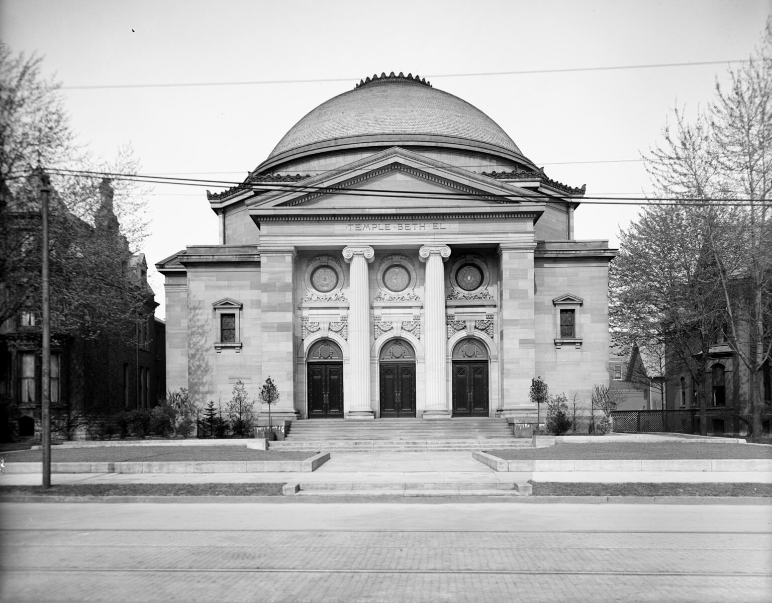 Photograph of exterior of building with domed roof.