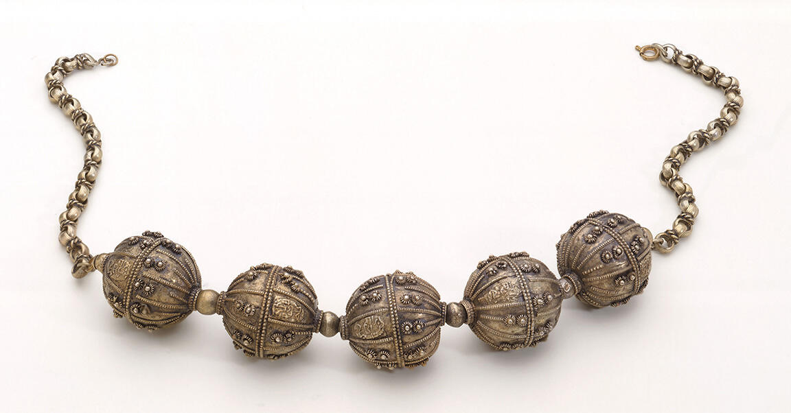 Necklace with five large beads on chain. Necklace with five large beads on chain.