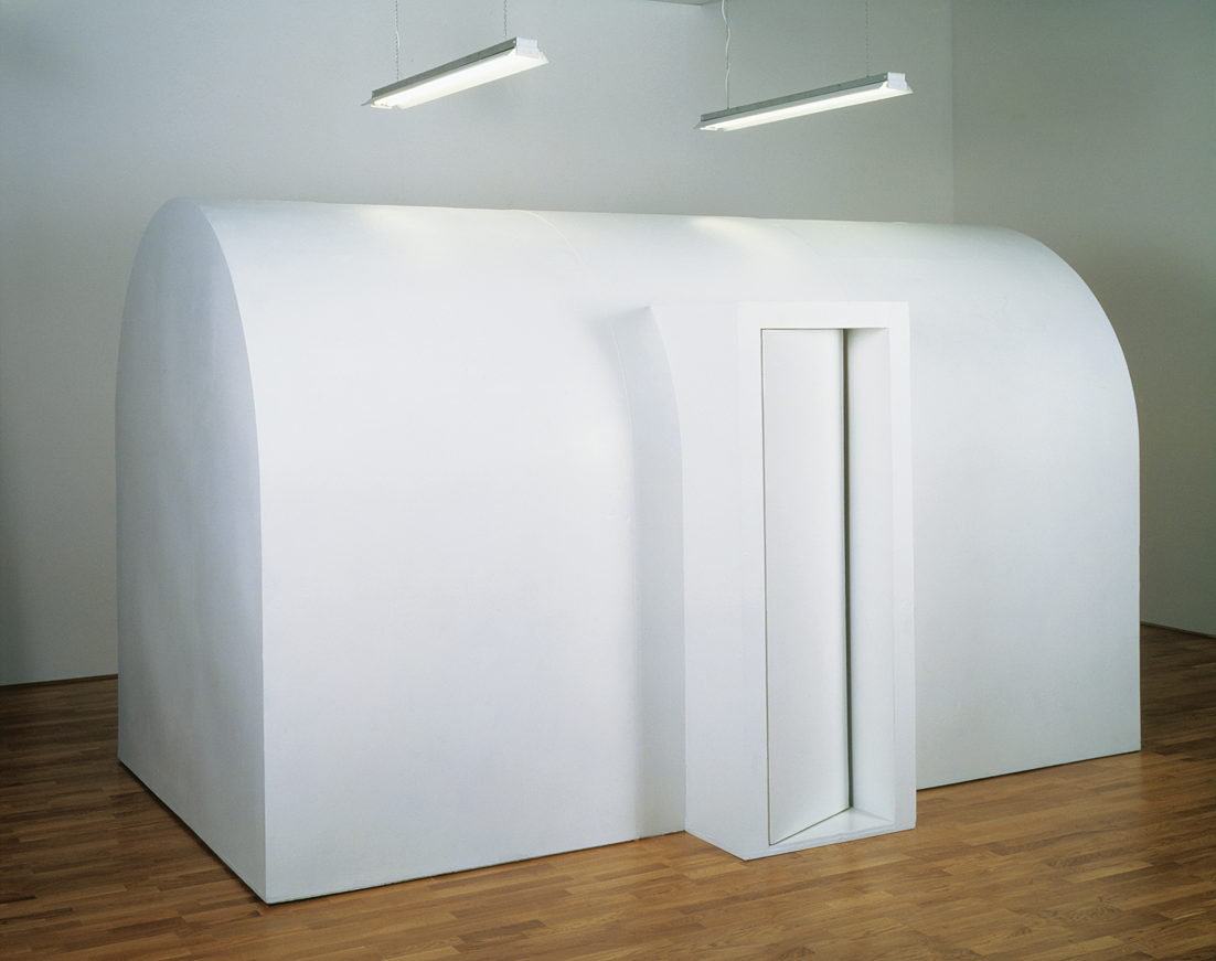 Art installation of large wooden domed structure with curved doorway. Art installation of large wooden domed structure with curved doorway.