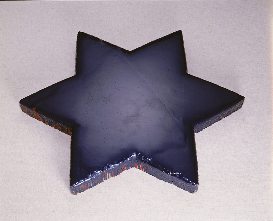 Sculpture of solid Star of David.
