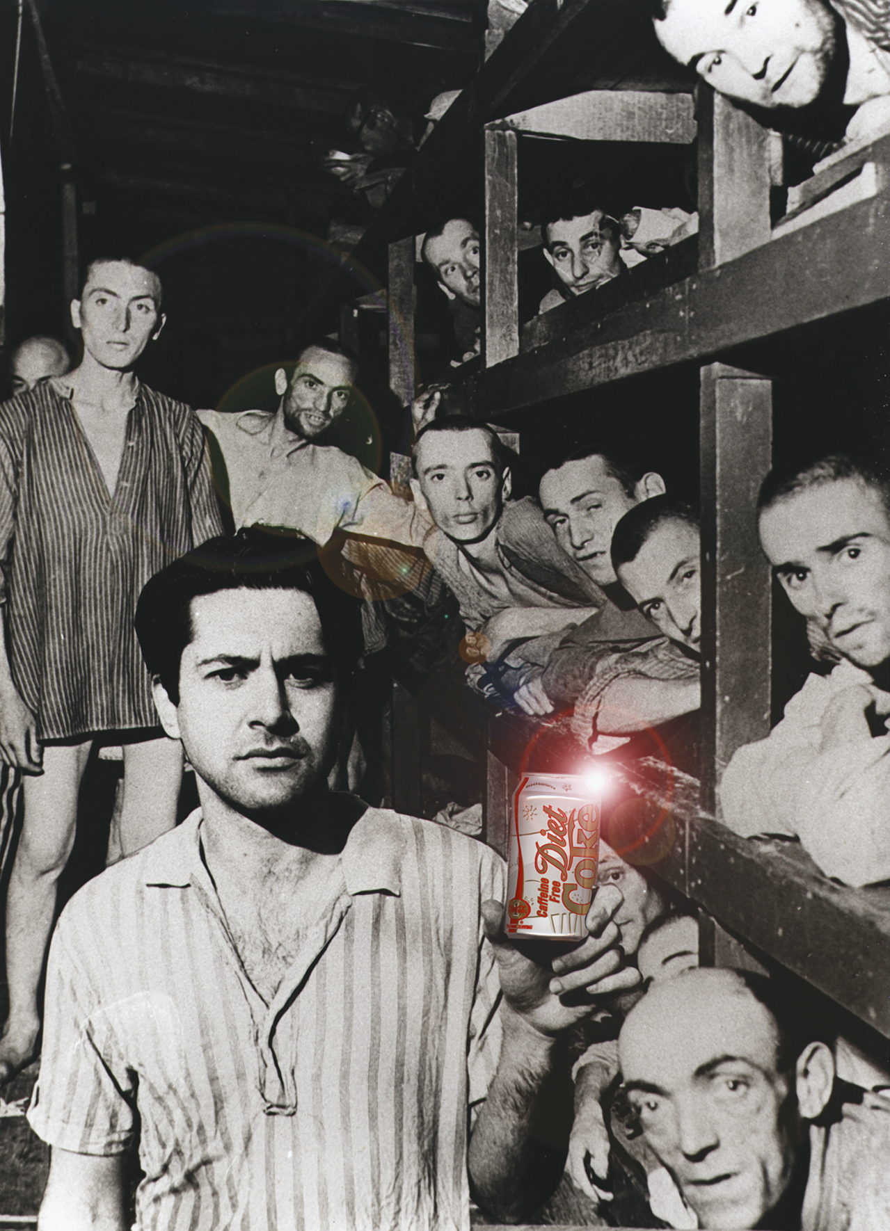 Photograph of men standing and sitting in bunks wearing striped shirts and looking at camera. The one closest to the camera holds a Diet Coke. Photograph of men standing and sitting in bunks wearing striped shirts and looking at camera. The one closest to the camera holds a Diet Coke.