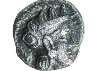 Coin with image of head wearing helmet.