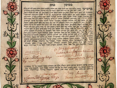 Page of Aramaic text framed by floral ornament with crown in top center and signatures in Roman alphabet and Spanish writing on bottom. 