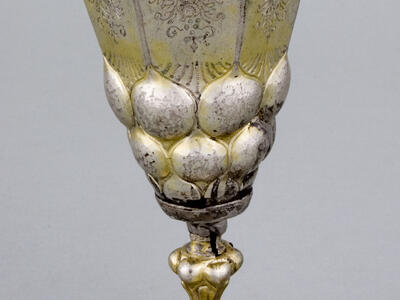 Cup engraved with floral motifs.