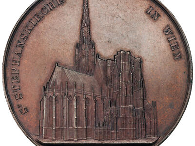 Medal with exterior of cathedral.