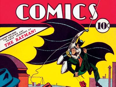 Detective Comics, May 1939: The Amazing and Unique Adventures of the Batman, cover Cover page of comic featuring man with bat wings outstretched swinging through the air over buildings with a villain under his arm as two detectives watch, and heading "Detective Comics" across the top.